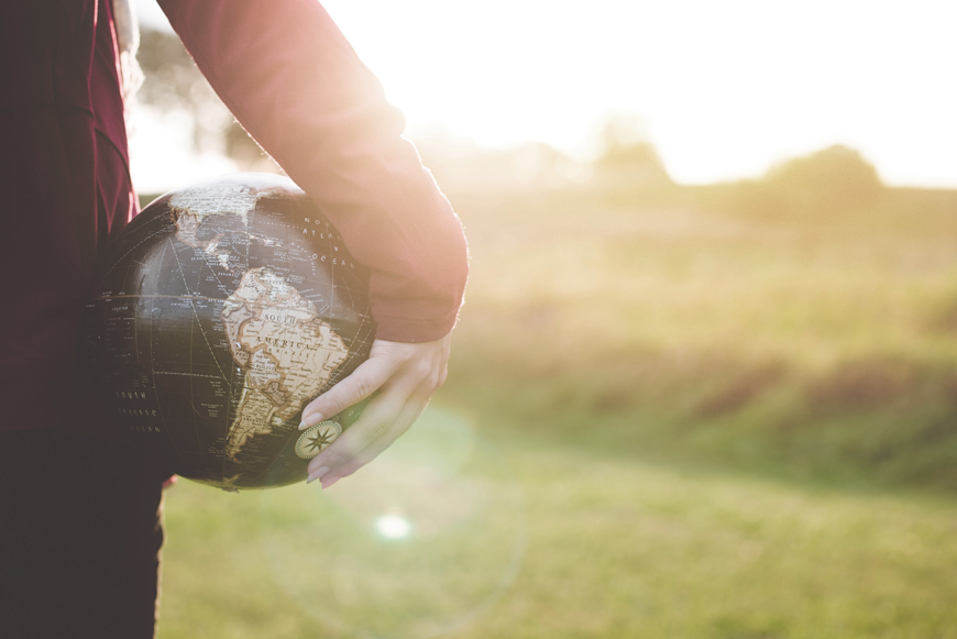 Globe in hand