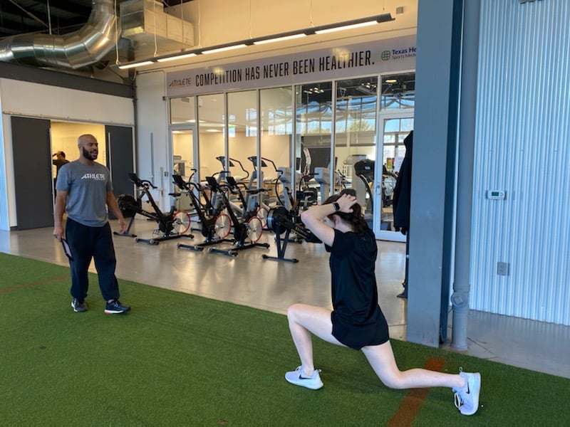 Frank Bourgeois works with Rebuild ATHlete member at the Arlington, Tx facility.