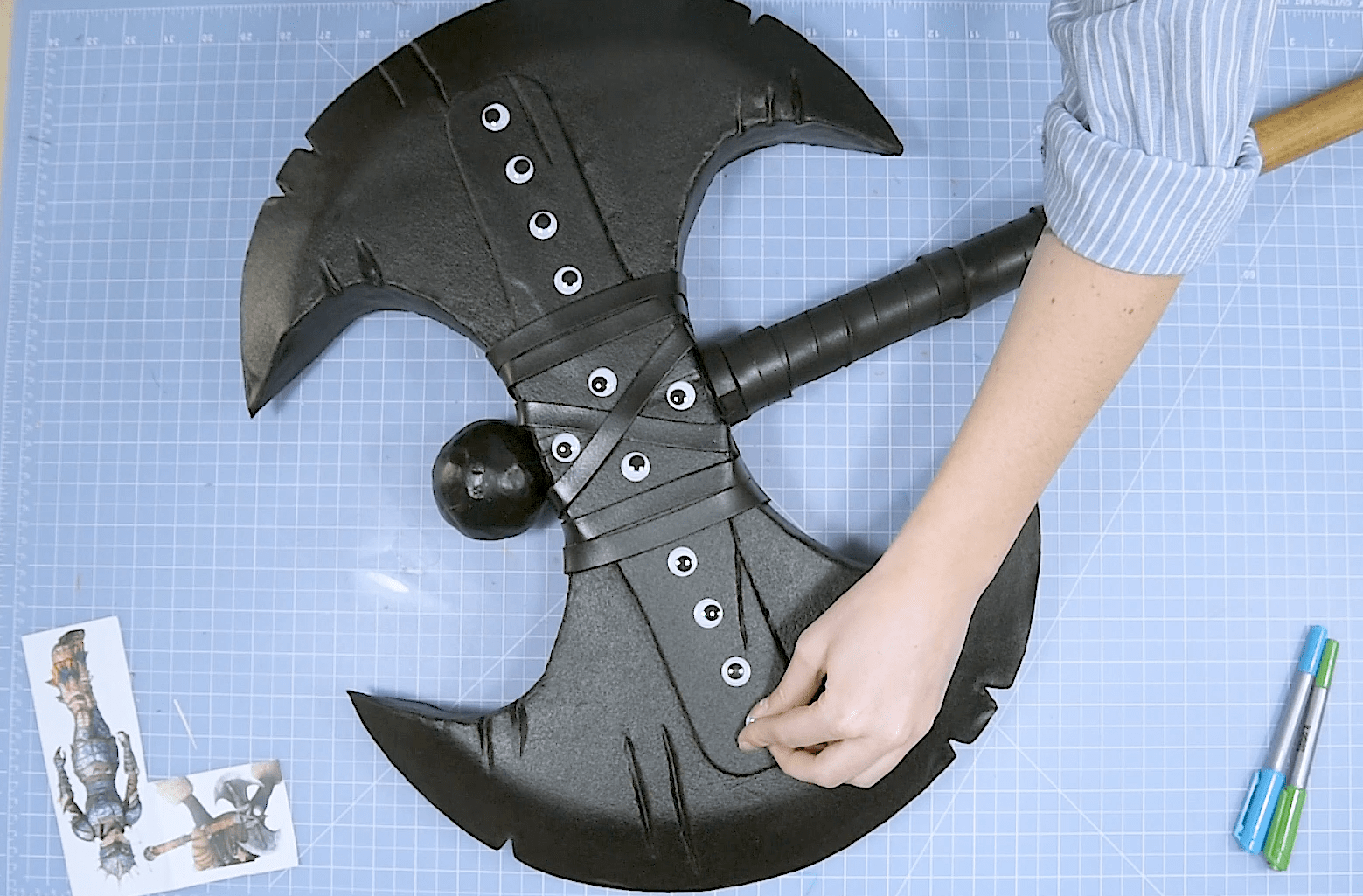 Astrid's axe cosplay weapon painted and ready to attach googly eyes for screw head details