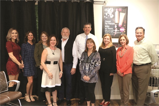 Congressman Darin LaHood (center in tie) hosts a community roundtable with salon owners and industry professionals to discuss the implications of legislation for a tip tax credit.