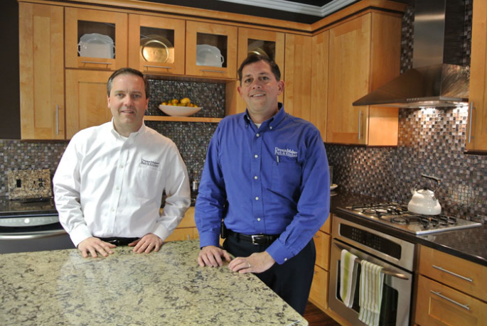 Lee Willwerth and Bob Ender inside their DreamMaker Bath & Kitchen Design Center in Ann Arbor, MI.