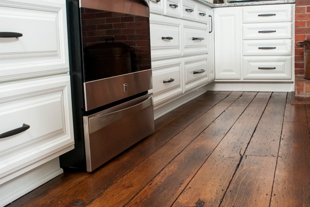 The Valuskas asked DreamMaker Bath & Kitchen of Mansfield, Ohio, to restore the 200-year-old wood floors in the kitchen of their home. It was just one part of a major transformation for the couple's kitchen.