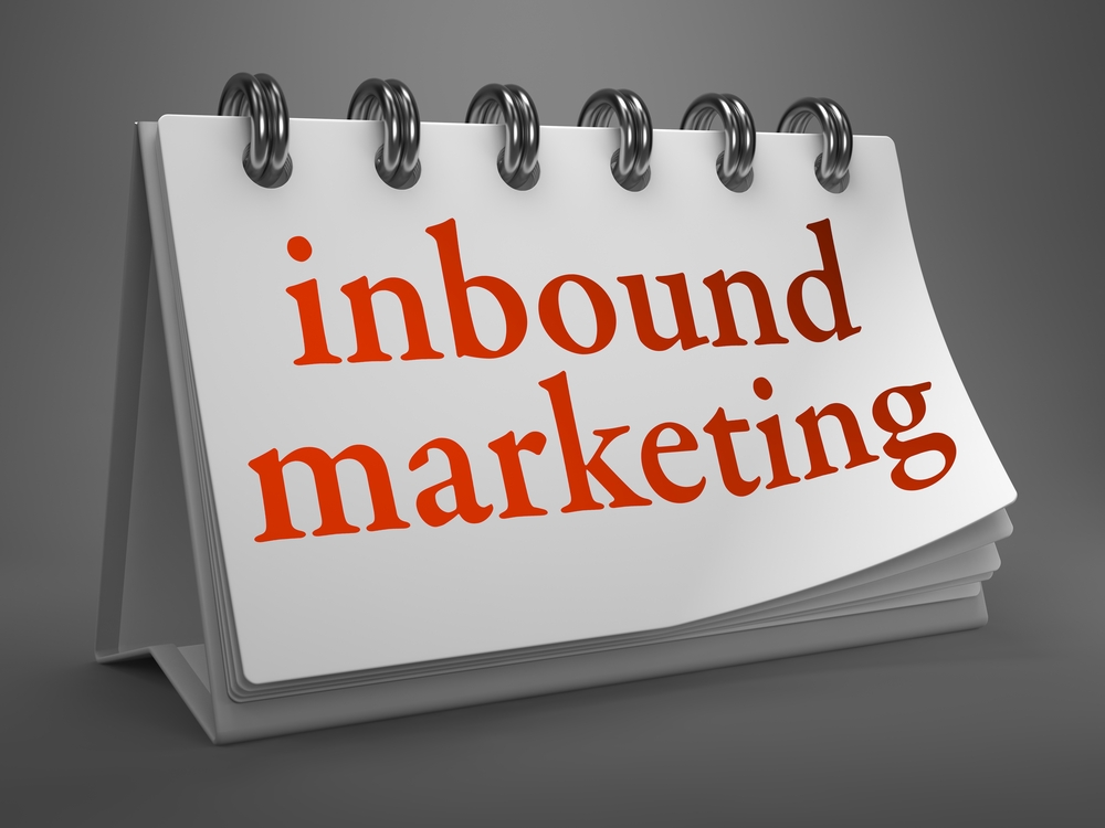 Inbound Marketing - Red Words on White Desktop Calendar Isolated on Gray Background.