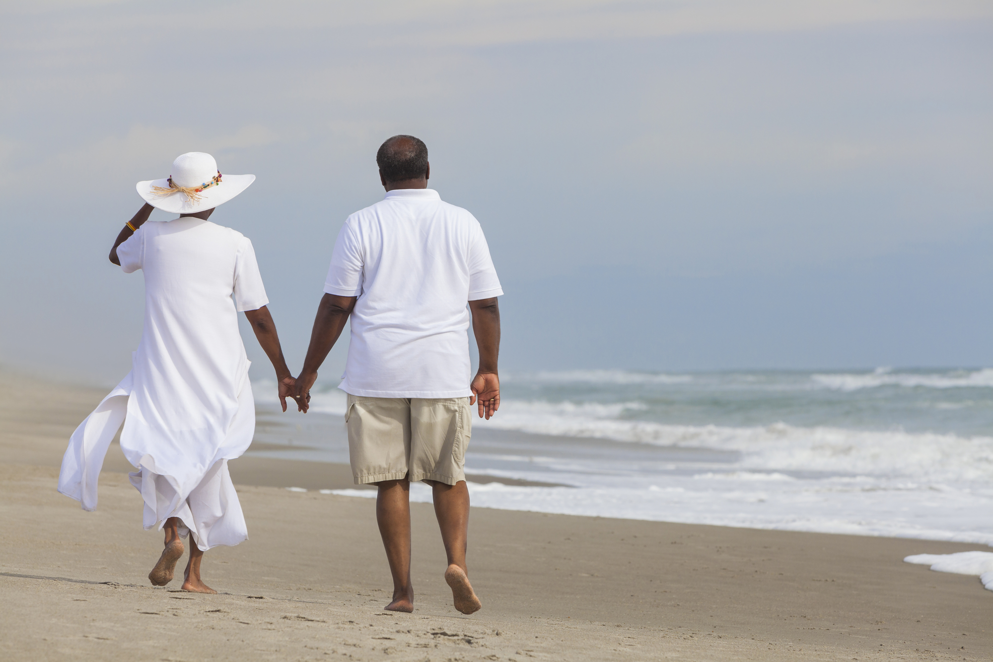 Happy Senior African American Couple Man Woman on Beach
