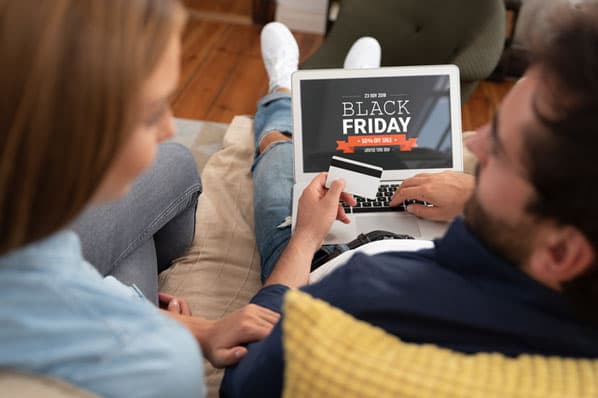 People look at Black Friday Ads