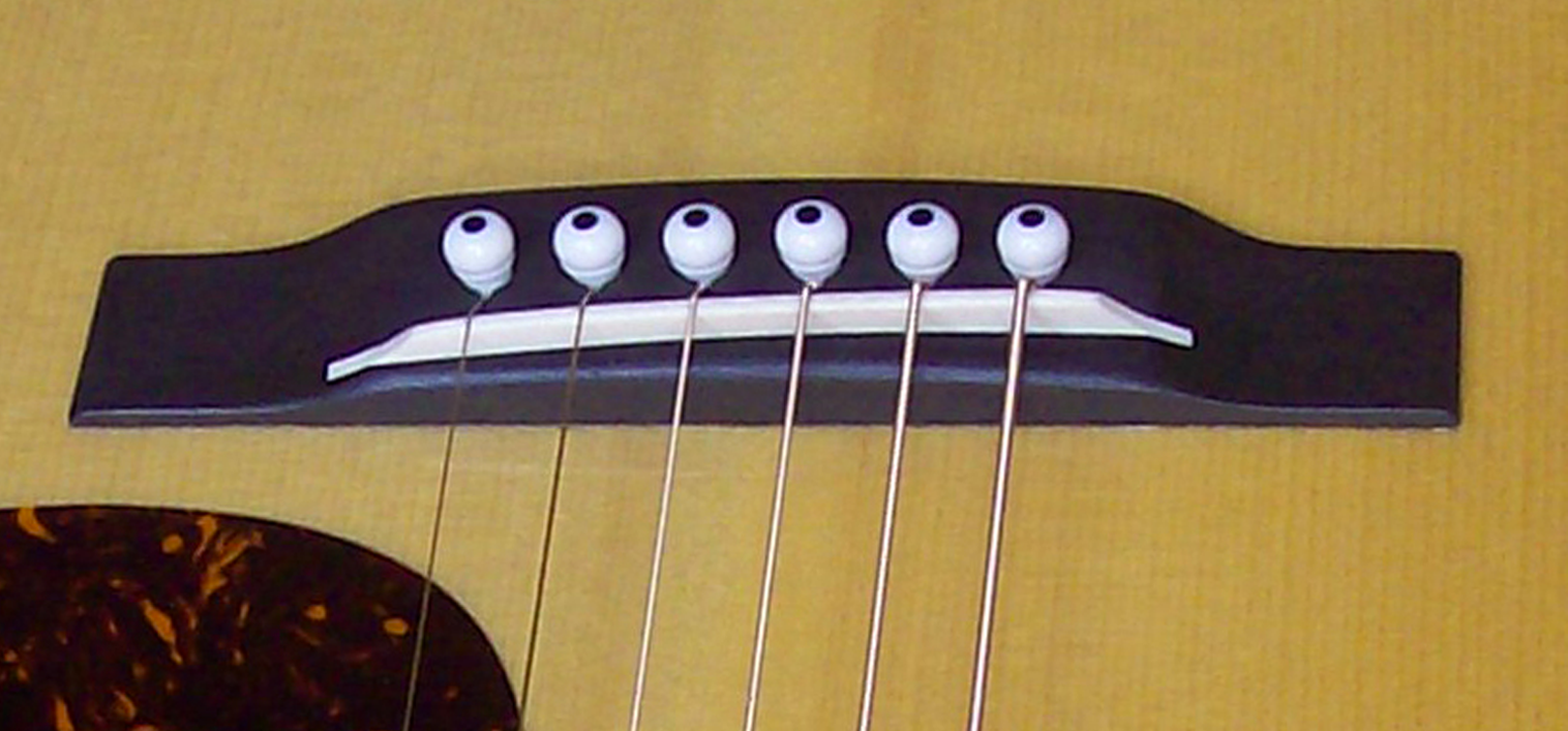 Cut Through vs. Drop In Guitar Saddles Banjo Studio