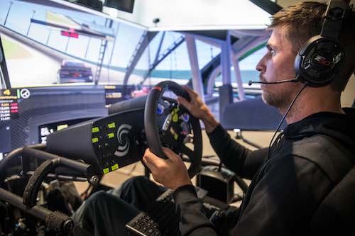 NASCAR's Denny Hamlin takes the wheel of his simulator