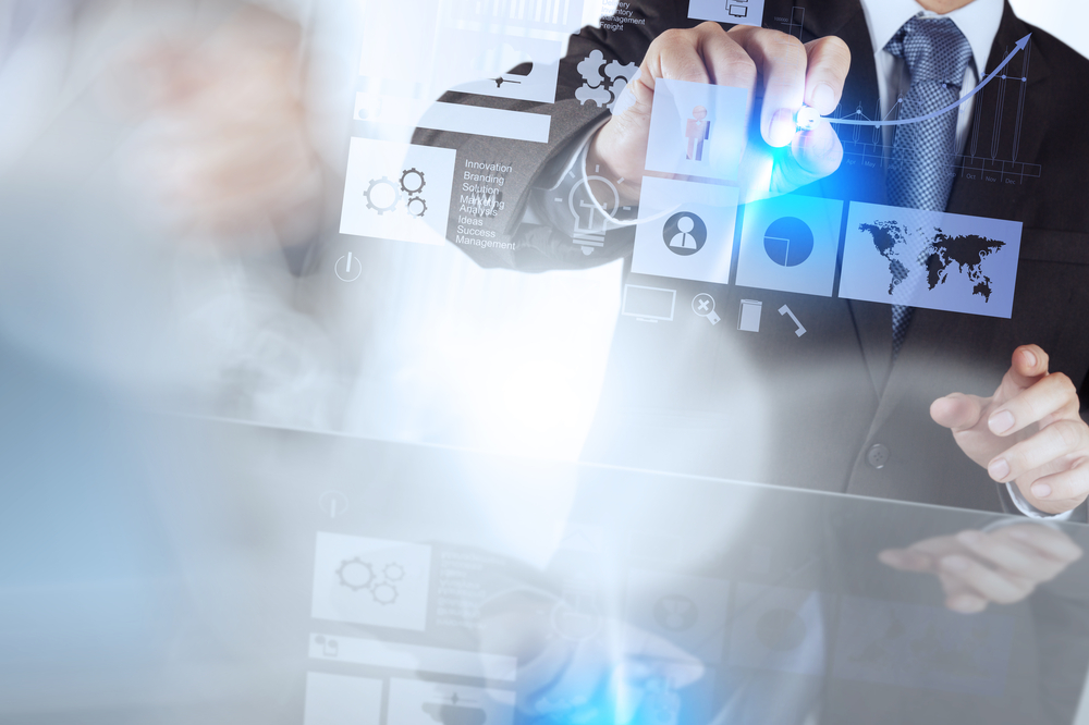 businessman hand working with new modern computer and business strategy as concept