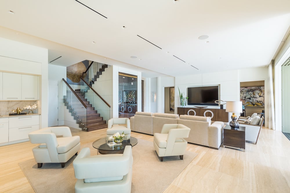 https://cdn2.hubspot.net/hubfs/6267609/Imported_Blog_Media/The-great-room-of-this-Port-Royal-estate-home-features-glass-and-wood-pieces-for-an-elegant-contemporary-design_.jpeg