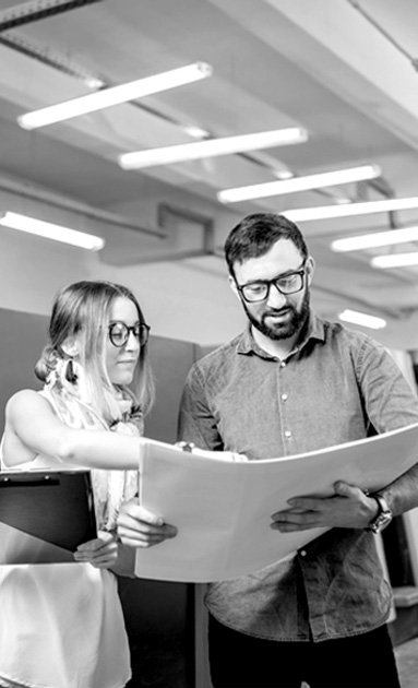 Coworkers discussing documents