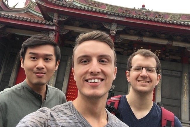 an English teacher in Taiwan with his two Taiwanese friends