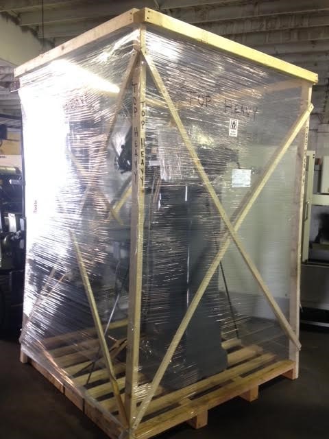shrink-wrapped shipping crate