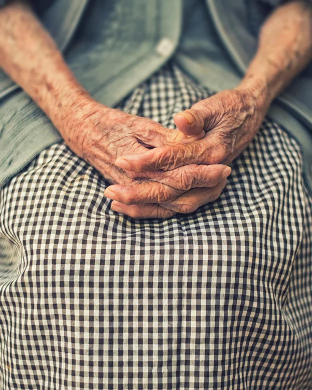 Old woman's hands interlocked
