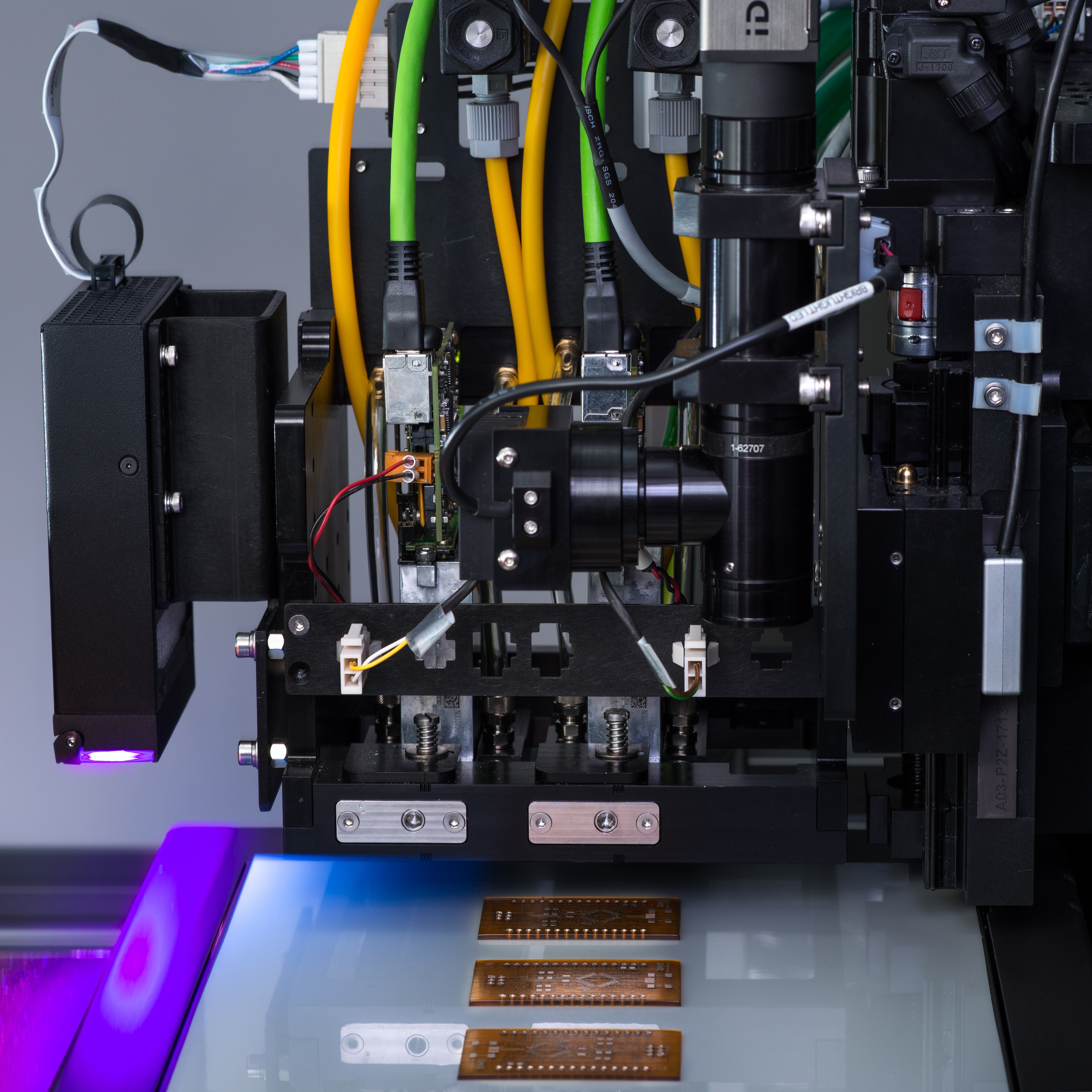 The DragonFly Pro System 3D printing a PCB using inkjet technology, one process to understand in the additive manufacturing vs. 3D printing discussion.