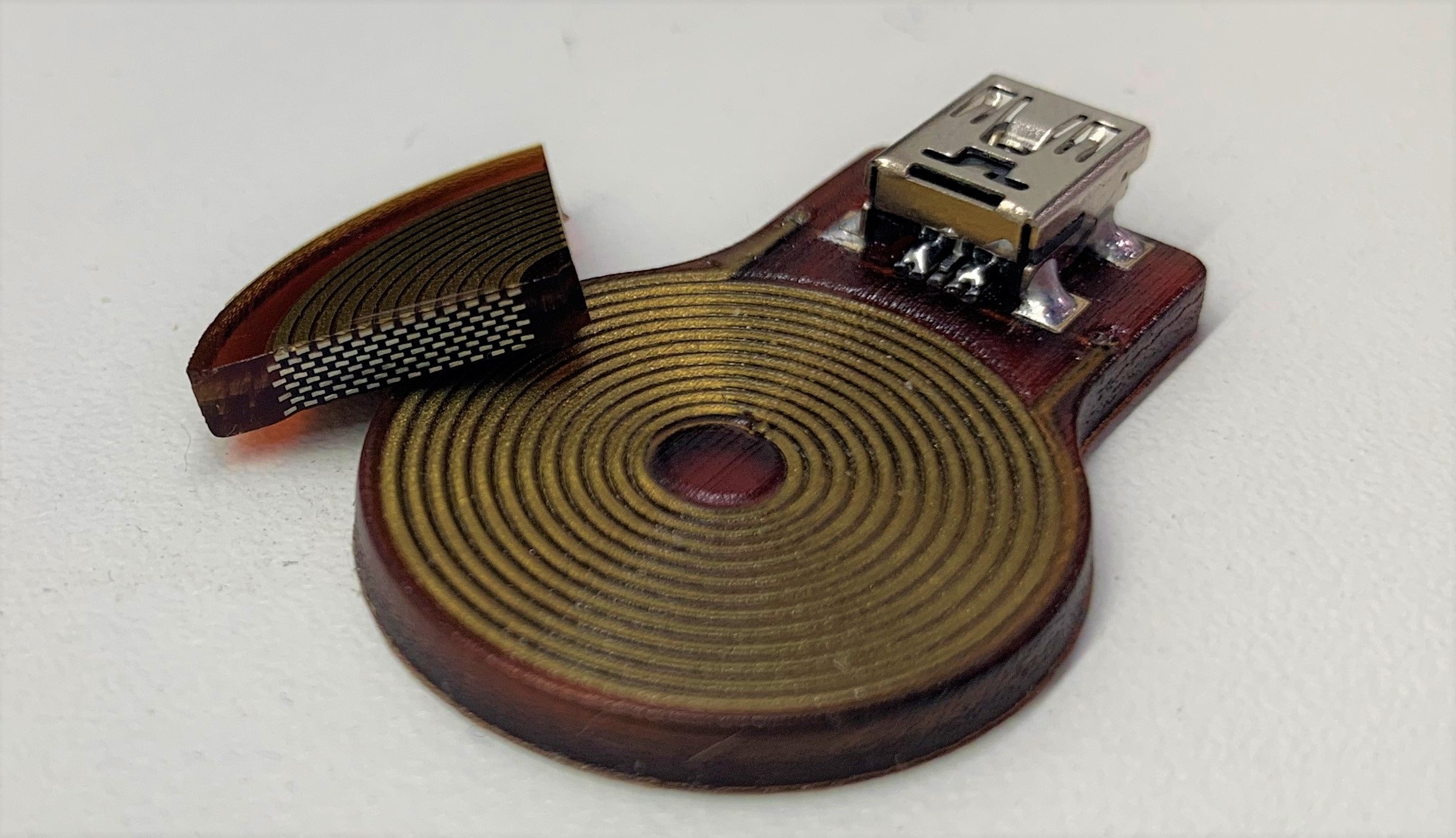 A 3D-printed electromagnetic coil shows electromagnetic coil applications made possible with additive manufacturing.