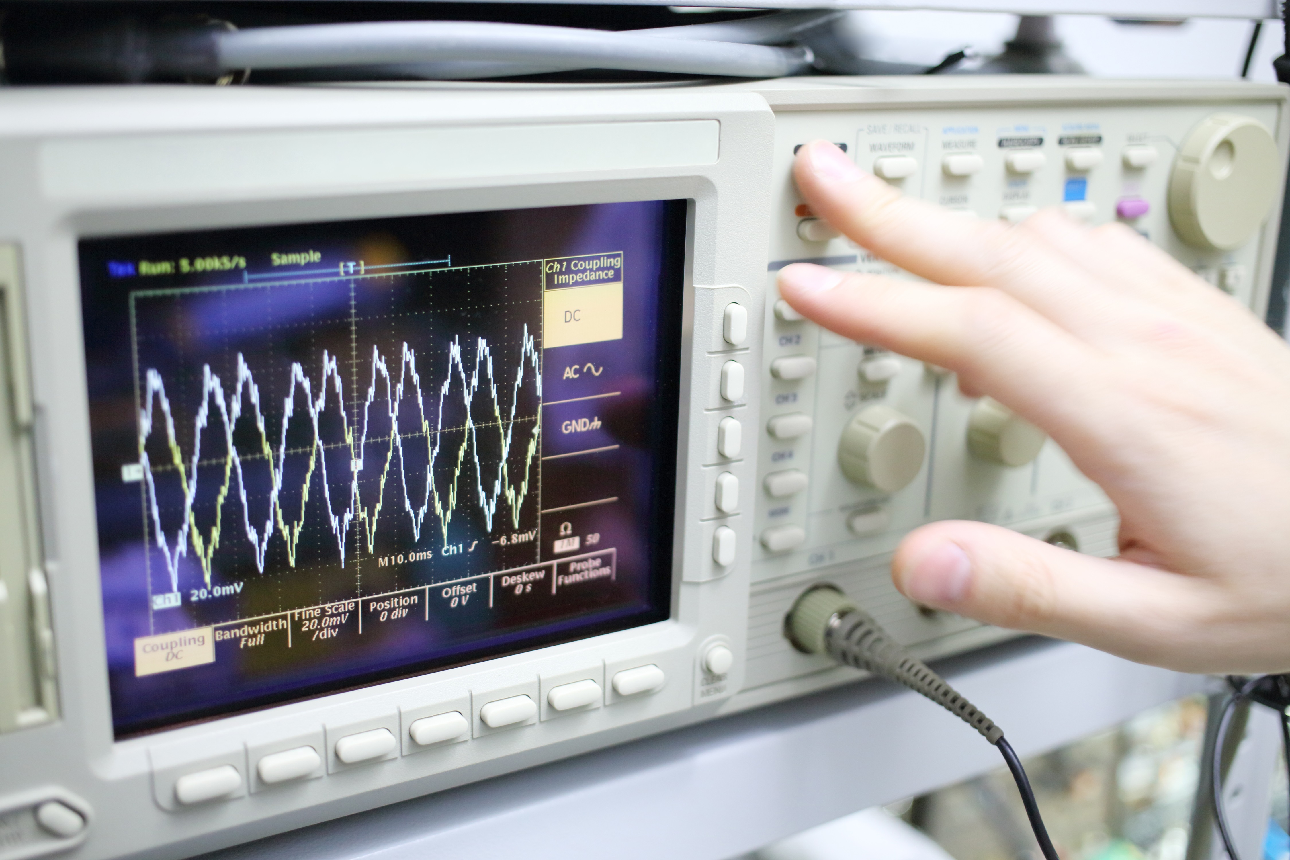 Analog signals on an oscilloscope.