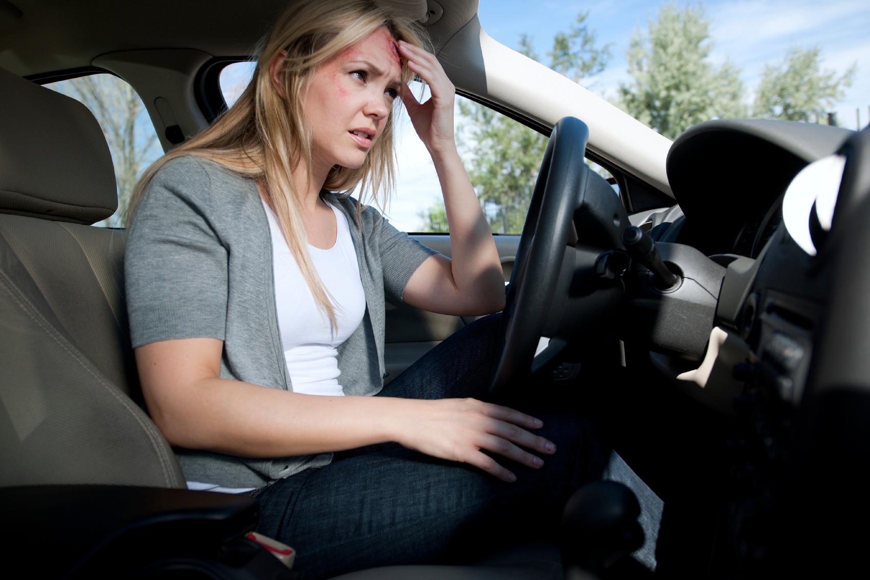 Woman Injured after hitting head on Steering Wheel After a Rear-End Collision